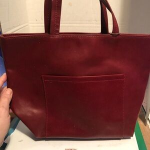 Elegant Red  Tote Bag by Estée Lauder , like new. Lots of room for essentials